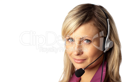 Young business woman talking on a headset