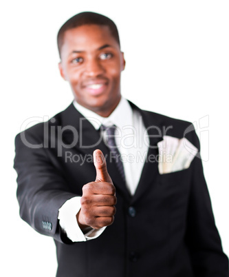 Close-up of a businessman with dollars in a pocket and thumb up