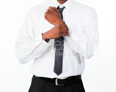 Close-up of businessman correcting a cuff link