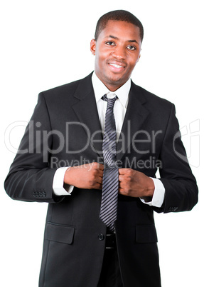 Portrait of Afro-American businessman correcting a tie