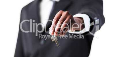 Close-up of a businessman holding a key