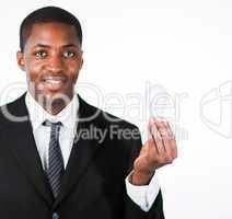 Afro-American businessman holding a light bulb