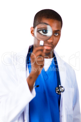 Young doctor looking through a magnifying glass