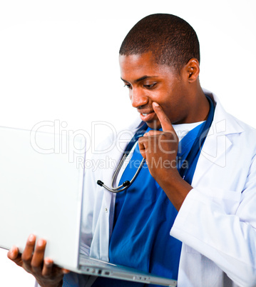 Close-up of an Thoughtful doctor working with a computer