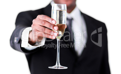 Close-up of an handsome businessman holdng a glass of champagne