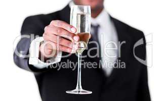 Close-up of an handsome businessman holdng a glass of champagne