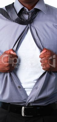Close-up of a businessman showing tshirt under his suit