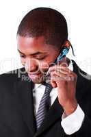 Businessman using an bluetooth earpiece