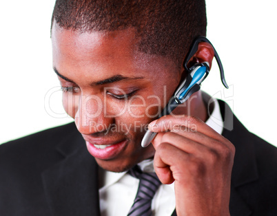 Close-up of an businessman using an bluetooth earpiece