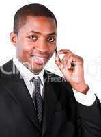 Businessman wearing an earpiece in front of the camera