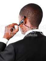 Businessman showing his earpiece