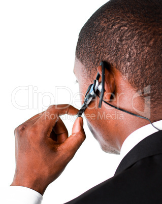 Close-up of an Businessman showing his earpiece