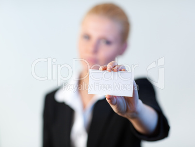 Business woman holding out a business card