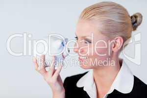 Business woman holding a piggy Bank