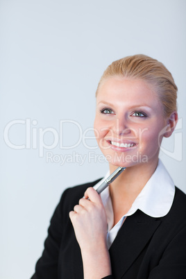 Businesswoman with pen in her hand