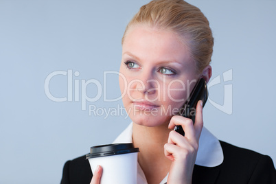 woman talking on the phone holding