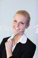 Businesswoman with pen in her hand