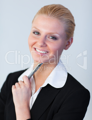 Businesswoman with pen in her hand