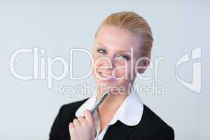 Businesswoman with pen in her hand