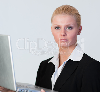 Student holding a laptop