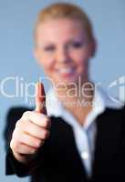 Businesswoman with thumbs up