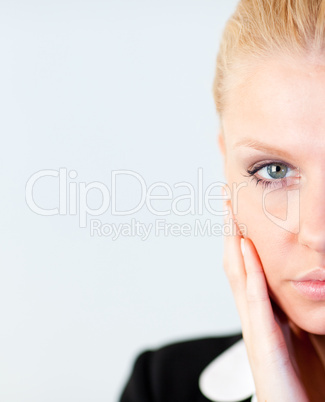 Woman with hand on her face
