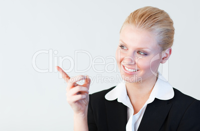 Businesswoman pointing to the side