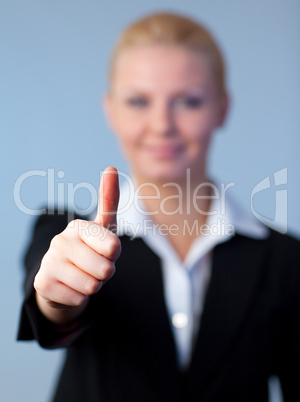 Businesswoman with thumbs up