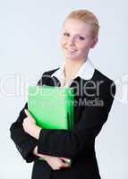 Business woman standing holding a folder