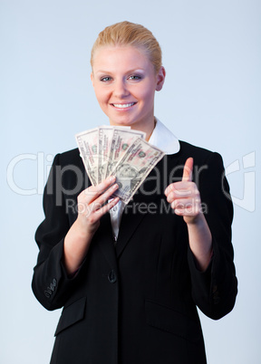 woman holding dollars with thumb up