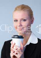 Businesswoman holding a coffee cup