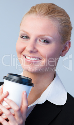 Businesswoman holding a coffee cup