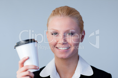 Businesswoman holding a coffee cup