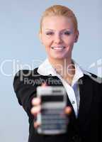 Business woman holding up a calculator