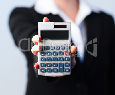 Business woman holding calculator