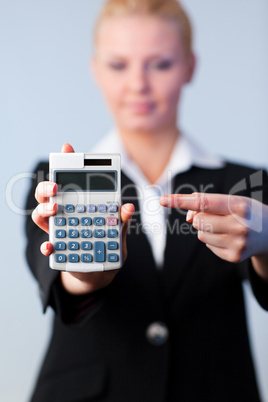 Business woman with a calculator