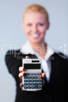 Business woman holding calculator