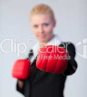 woman showing boxing glove to the camera