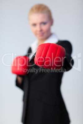 woman showing boxing glove to the camera