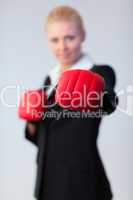 woman showing boxing glove to the camera