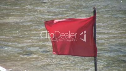 Red flag on the beach
