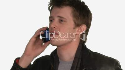 young man dials cell phone