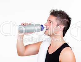 athlethic young man holding a sports bottle