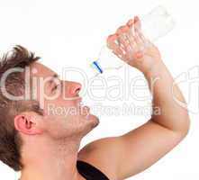 Man drinking water after workout