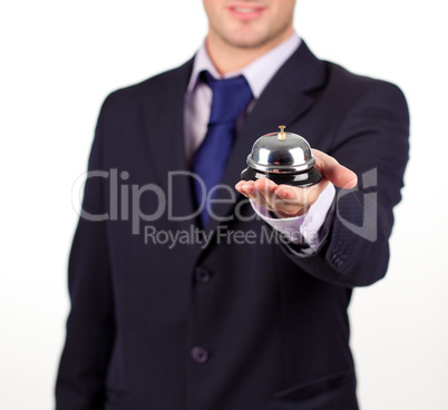 waiter holding a hotel bell
