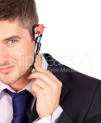 man on headset looking at the camera