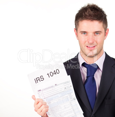 Man holding out his irs returns form