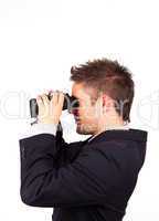 man looking through Binoculars
