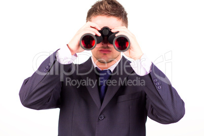 Man looking through binoculars