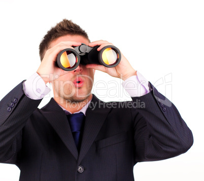 man looking through binoculars surprise